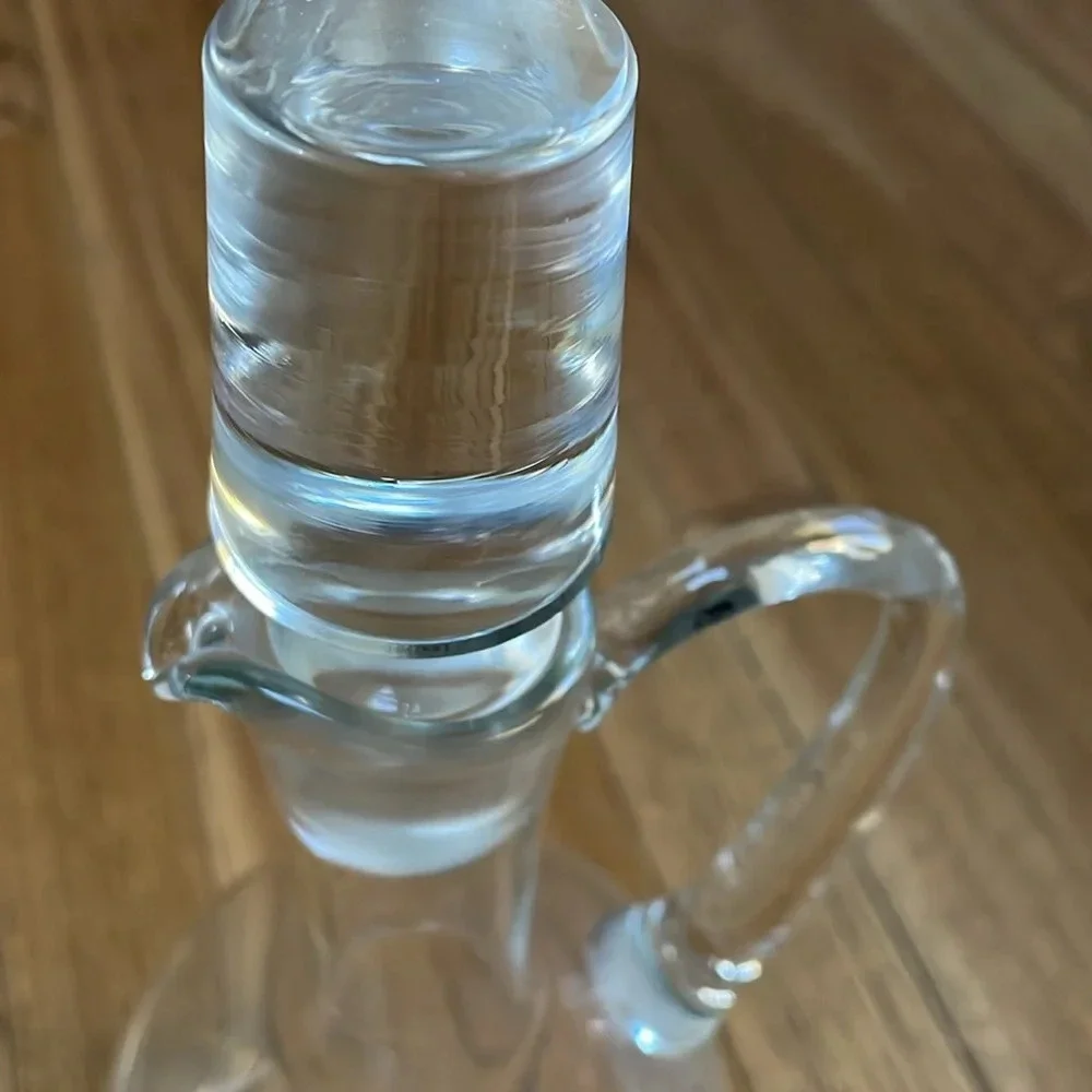 Vtg glass decanter w/ stopper Spout & handleExcellent condition. No chips/cracks